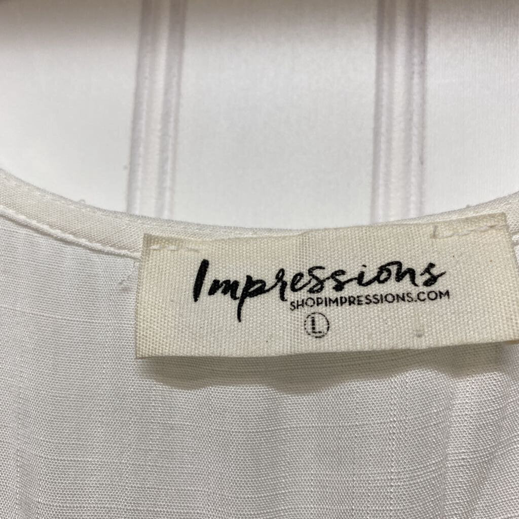 SLEEVELESS V NECK BLOUSE