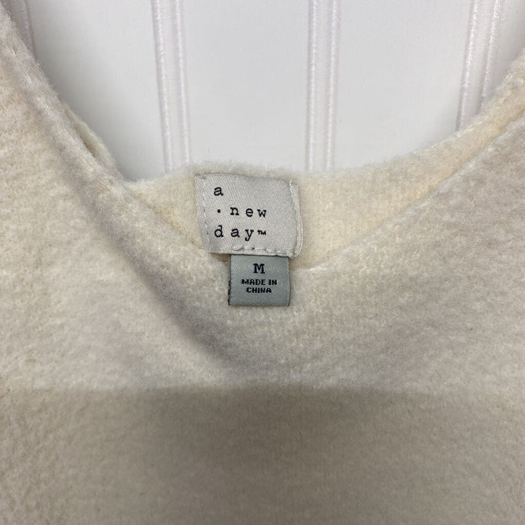 SLEEVLESS CROP SWEATER
