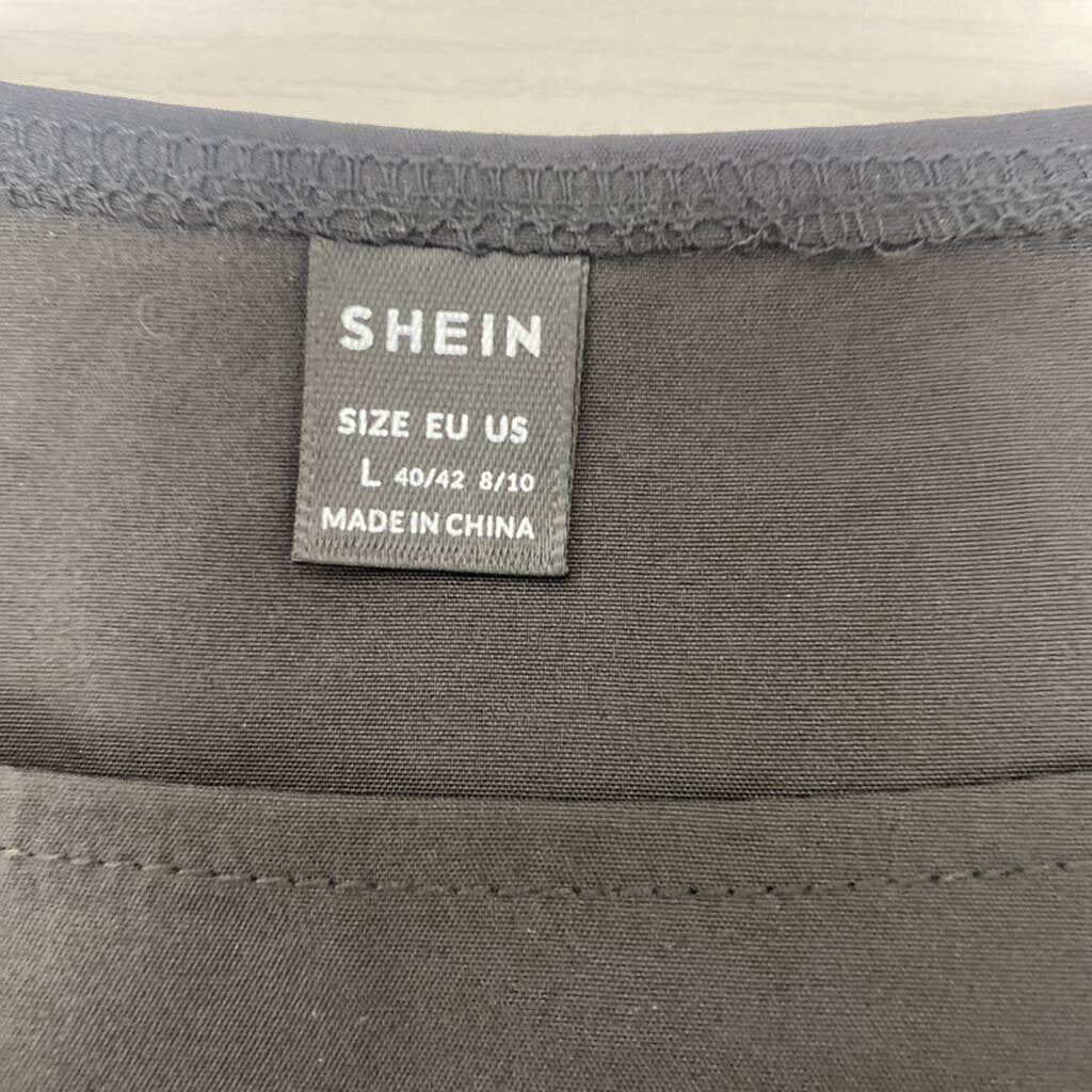 SHORT SLEEVE RUFFEL TOP
