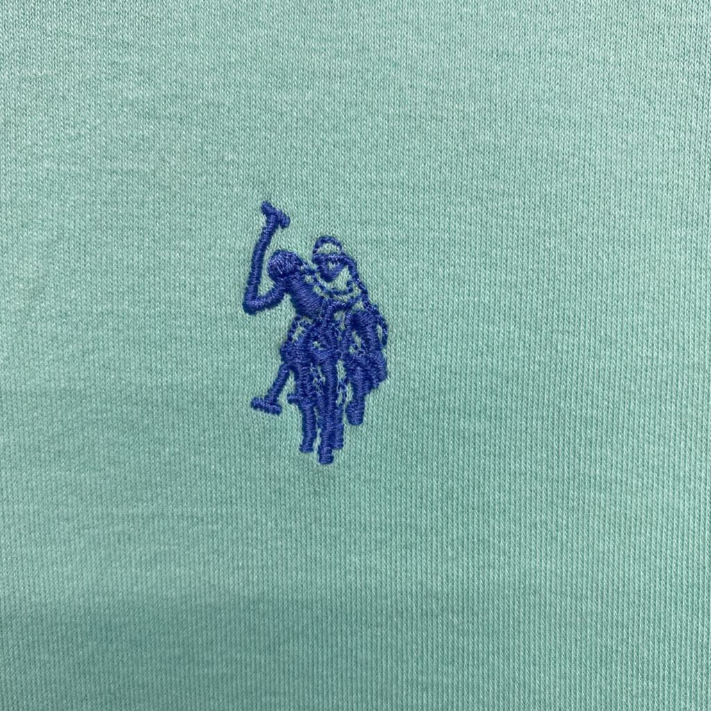teal polo shirt