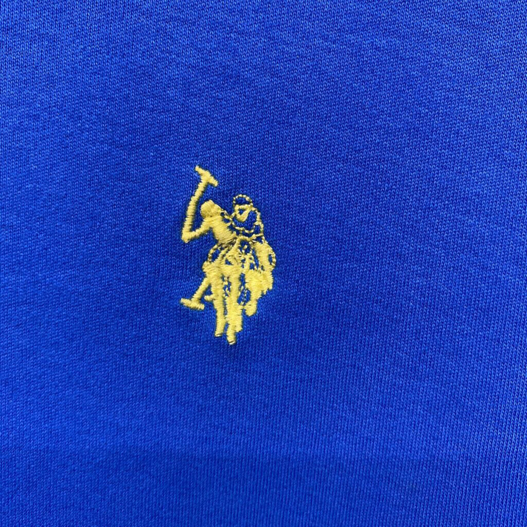 blue polo shirt