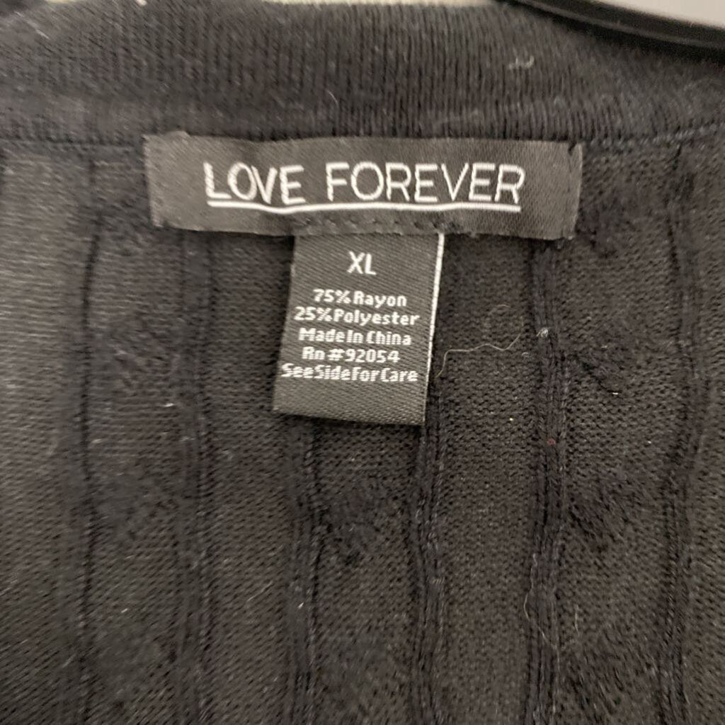 COLLARED SLEEVELESS SWEATER