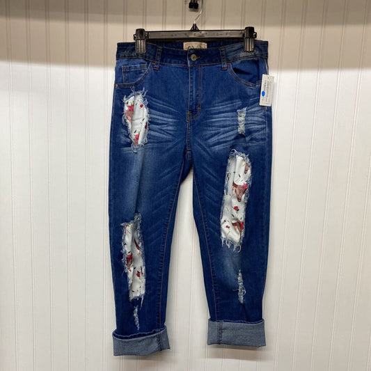 DISTRESSED DENIM CAPRIS