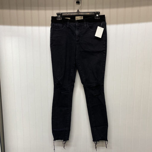 DISTRESSED SKINNY JEANS