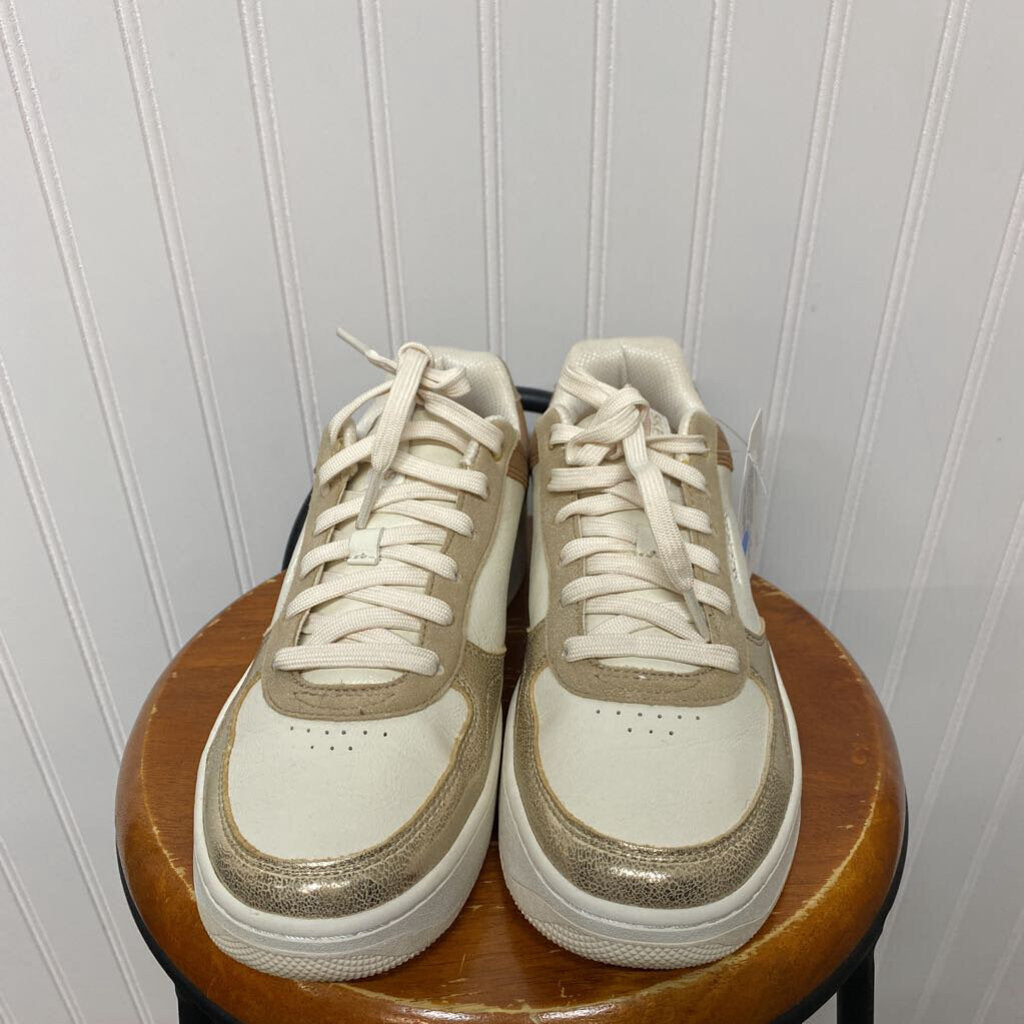 CREAM AND TAN TENNIS SHOES