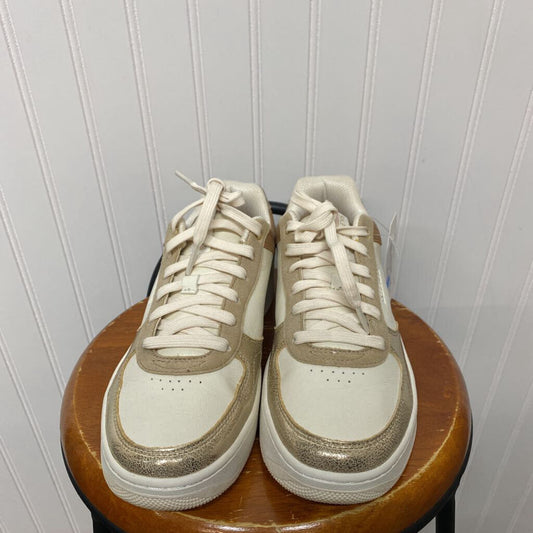 CREAM AND TAN TENNIS SHOES