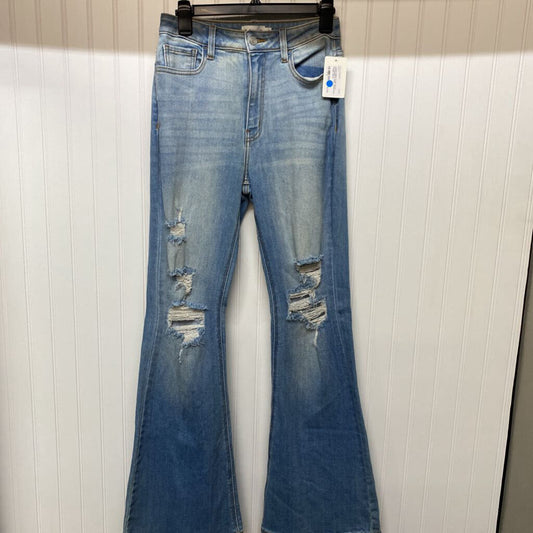 DISTRESSED FLARED JEANS