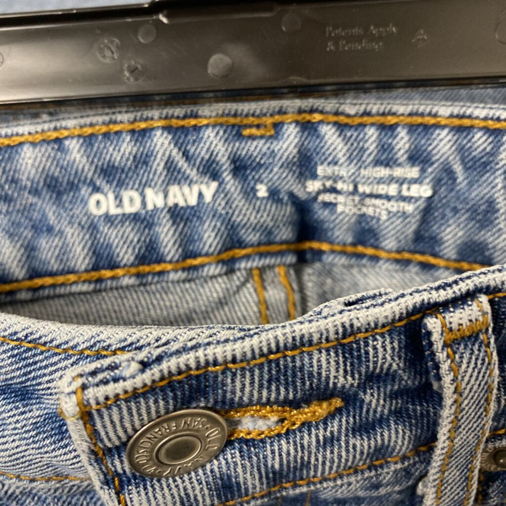 EXTRA HIGH-RISE SKI-HI WIDE LEG DISTRESSED DENIM JEANS