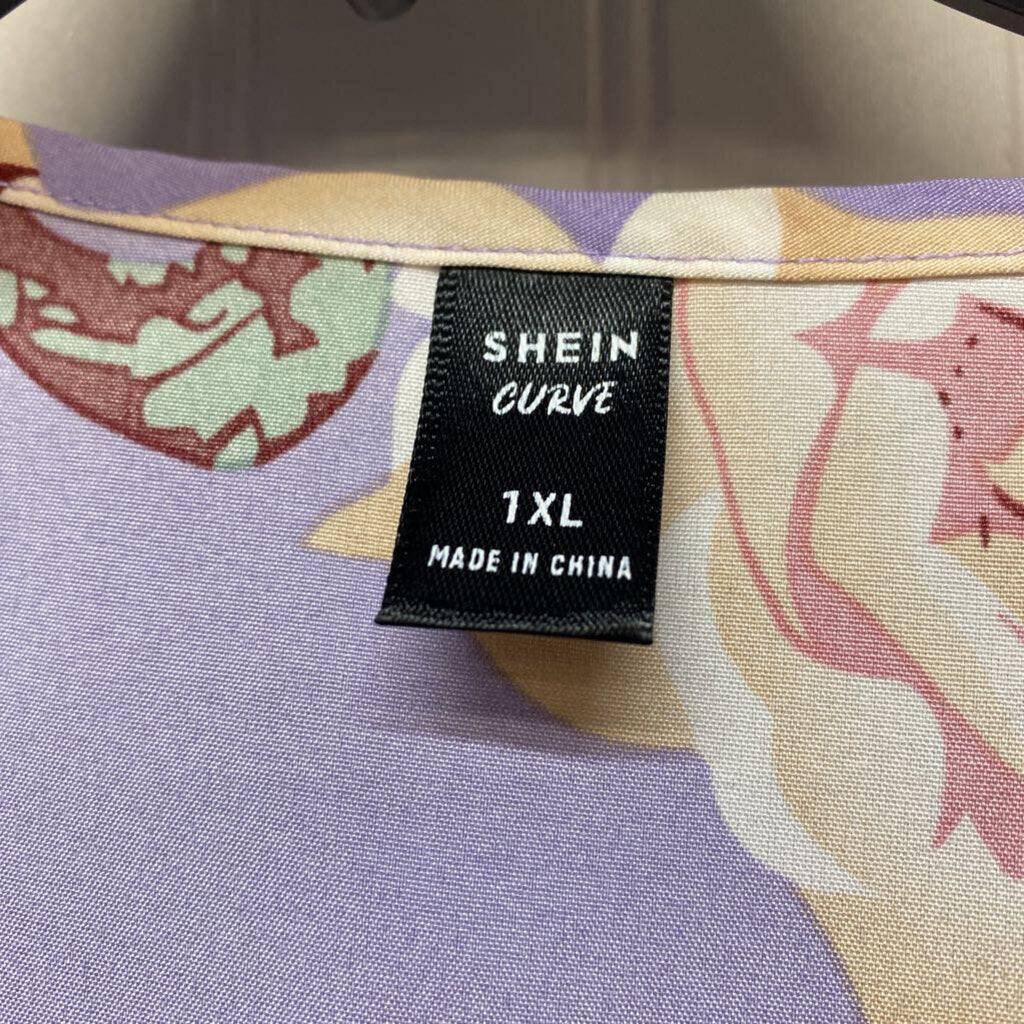 SLEEVELESS BLOUSE
