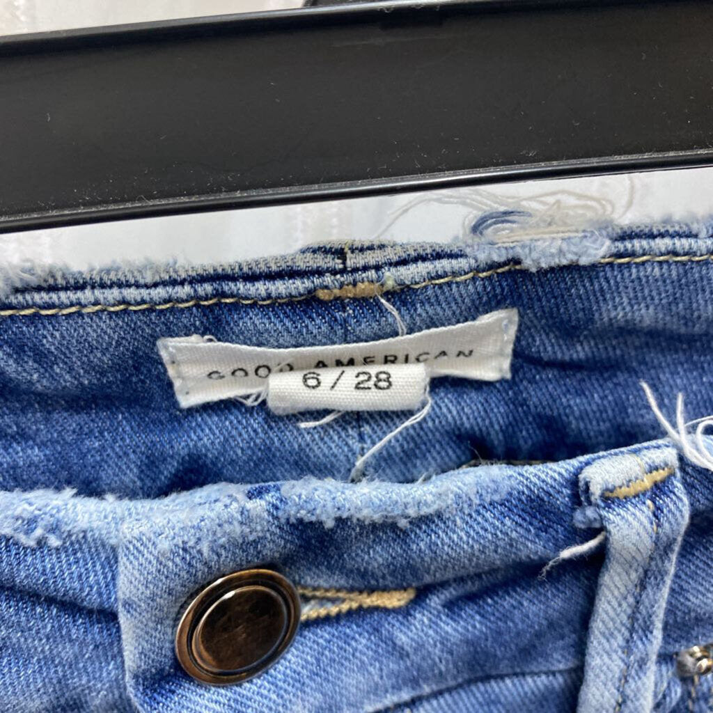 DISTRESSED DENIM JEANS