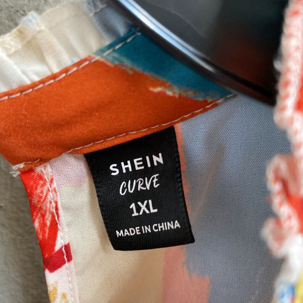 SLEEVELESS BLOUSE