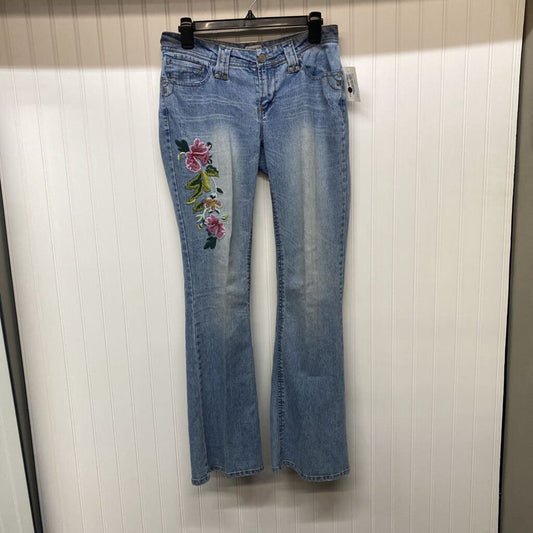 EMBROIDERED LEGGED JEANS