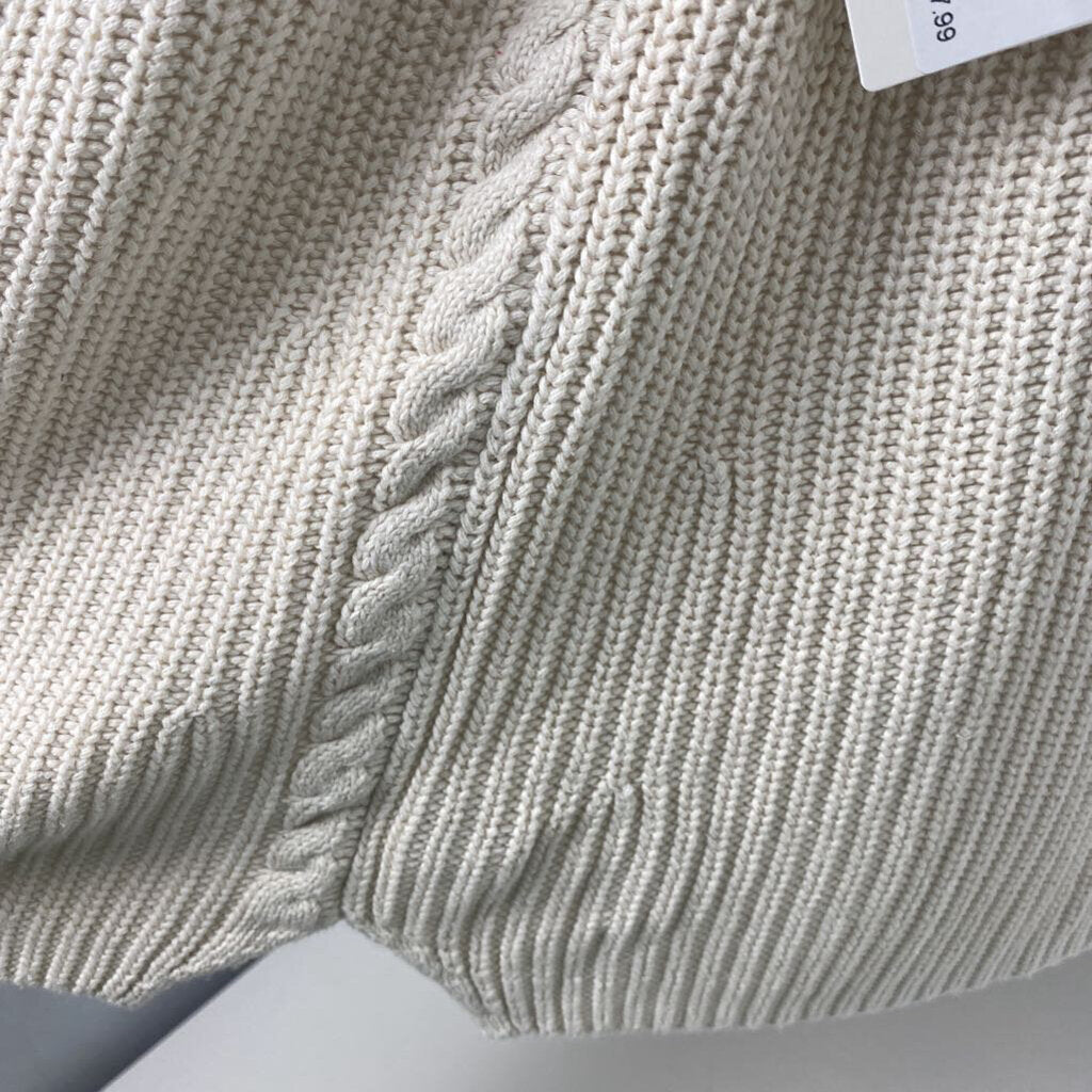SLEEVLESS SWEATER
