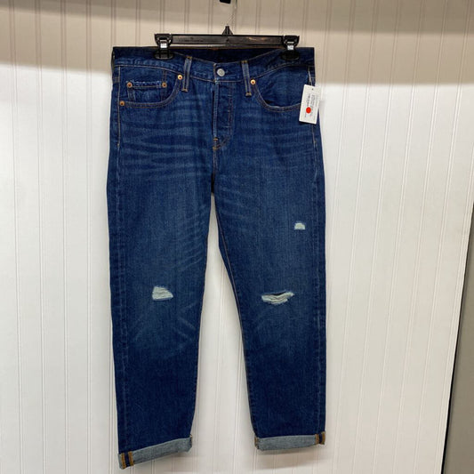 BUTTON FLY TAPERED JEANS