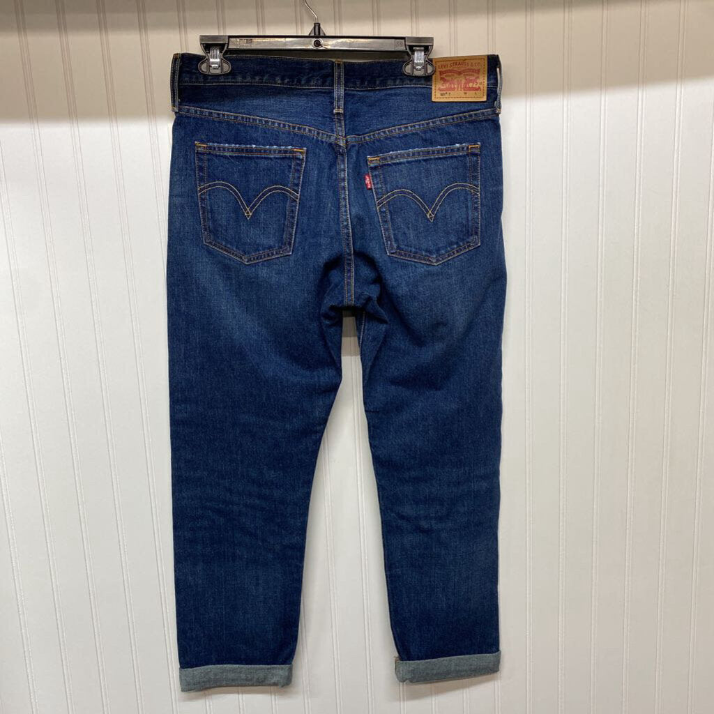 BUTTON FLY TAPERED JEANS