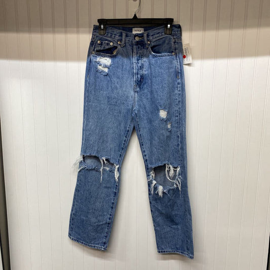 DISTRESSED RIPPED JEANS