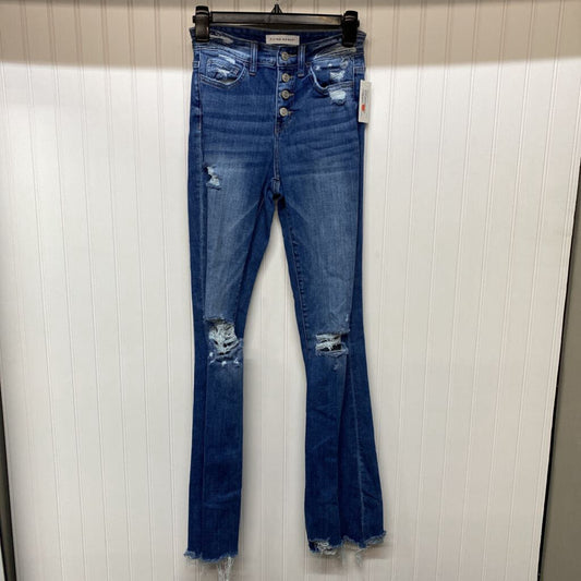 *MULTI BUTTON DISTRESSED FLARE JEANS