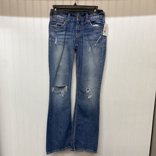 BOOT CUT DISTRESSED JEANS