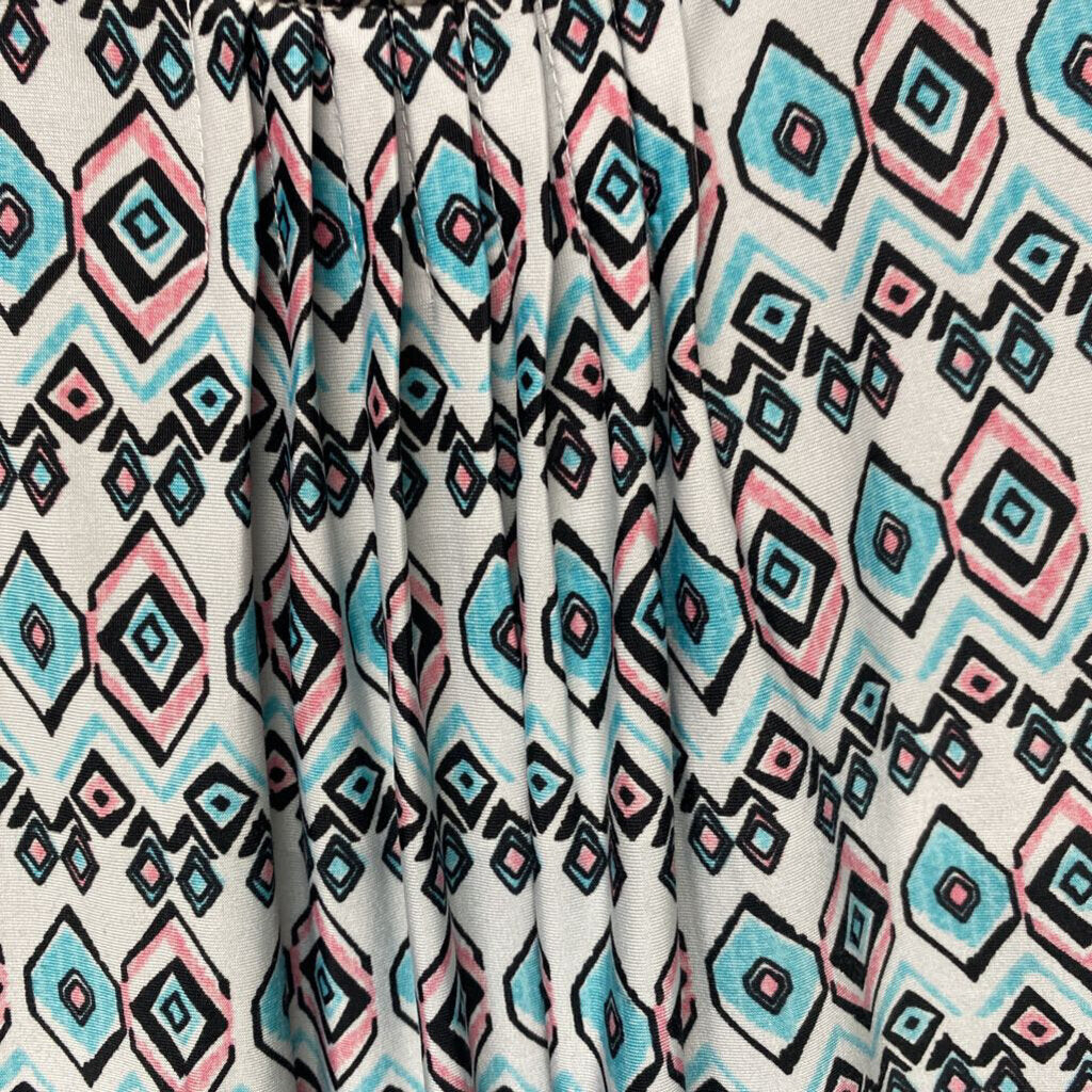 PLEATED SHORT SLEEVED